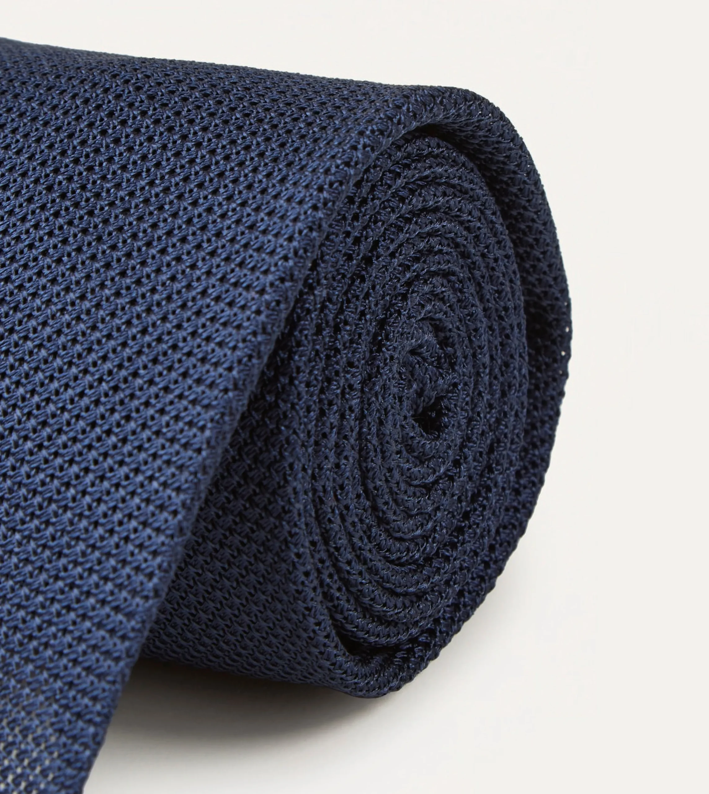 Drake’s Navy Fine Woven Grenadine Silk Hand Rolled Tie
